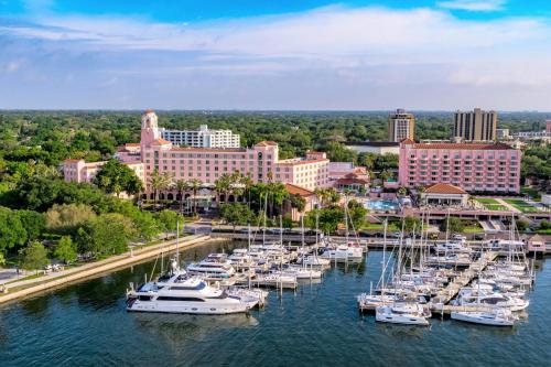 an aerial view of a marina with boats in the water at The Vinoy Resort & Golf Club, Autograph Collection in St. Petersburg