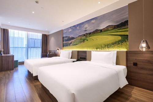 Mercure Xi'an Daming Palaceにあるベッド