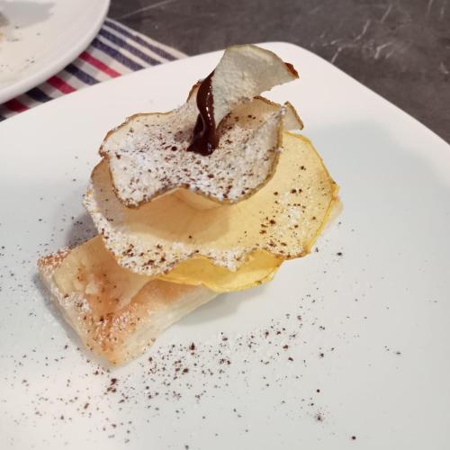 a piece of food on a white plate at SANTINO'S HOUSE in Peveragno