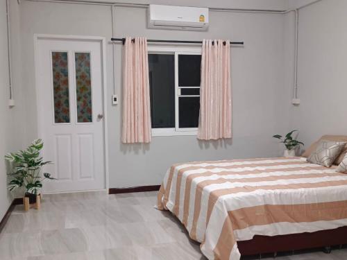 Cama o camas de una habitación en The Little home