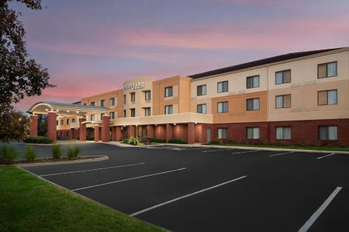 a rendering of a hotel with a parking lot at Courtyard by Marriott Knoxville Airport Alcoa in Alcoa