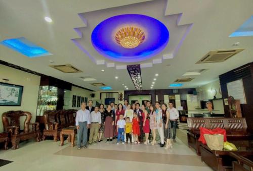 a group of people standing in a church at Phương Anh 7 in Da Nang