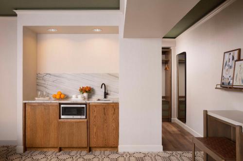 a kitchen with a column in a room at Hyatt Regency Greenwich in Greenwich
