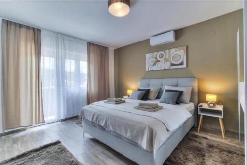 Postel nebo postele na pokoji v ubytování Apartman Mila