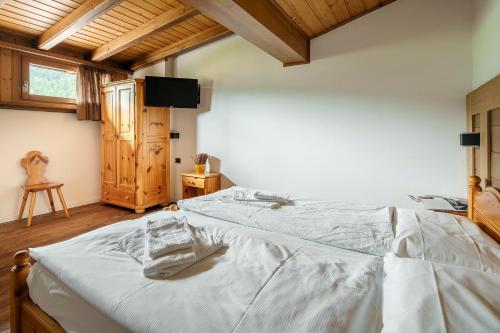 Postel nebo postele na pokoji v ubytování Nord Hotel