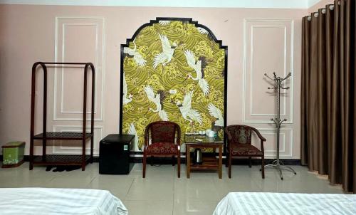 Thuỳ Dương Hotel Cao Bằngにあるベッド