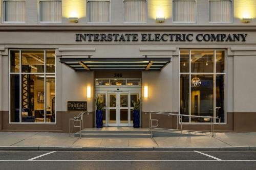 a building with an entrance to an interstate electric company at Fairfield Inn & Suites by Marriott New Orleans Downtown/French Quarter Area in New Orleans