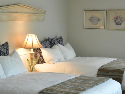 Ein Bett oder Betten in einem Zimmer der Unterkunft Basin Harbor