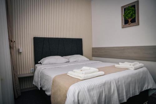 Katil atau katil-katil dalam bilik di HOTEL GOLDEN CITY