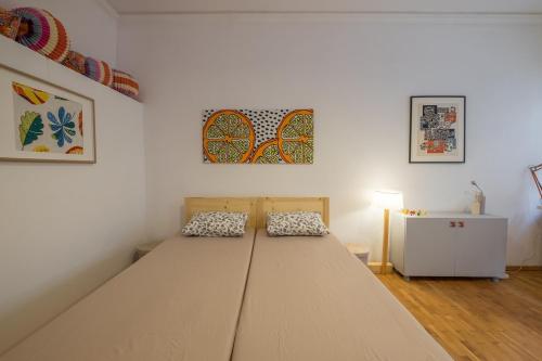 a bedroom with a large bed in a room at THE GOOD PLACE - historical center, unique in Sofia