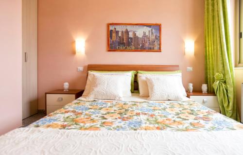 Ένα ή περισσότερα κρεβάτια σε δωμάτιο στο Il Sole Guesthouse