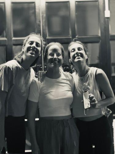 a group of three women standing next to each other at David Residency in Madurai