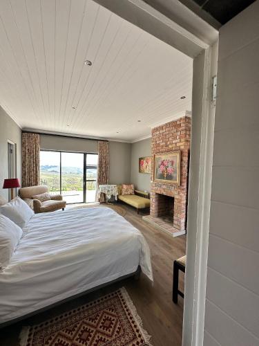 Ένα ή περισσότερα κρεβάτια σε δωμάτιο στο Blossom Cottage, Elgin Grabouw