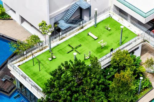 an overhead view of a lawn in the middle of a building at Midhills Genting Highlands in Genting Highlands