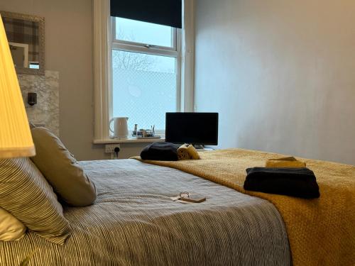 St Andrews house Hotelにあるベッド
