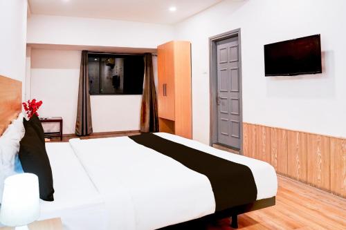 Μια τηλεόραση ή/και κέντρο ψυχαγωγίας στο Super Townhouse Nagpur Railway Station
