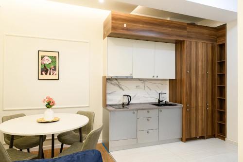 Kuchyň nebo kuchyňský kout v ubytování AXIOM Apartments