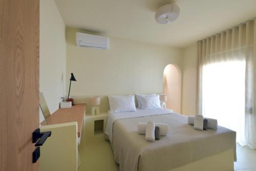 En eller flere senge i et værelse på carilia