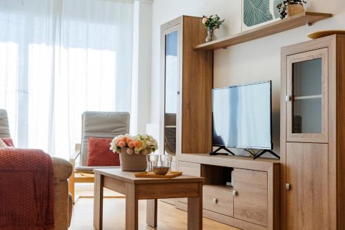 TV a/nebo společenská místnost v ubytování Los Olivos