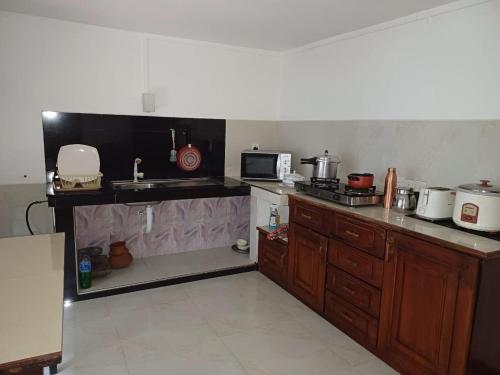 Η κουζίνα ή μικρή κουζίνα στο Villa Chenu