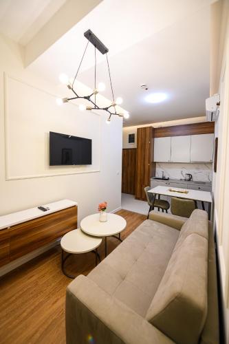 Kuchyň nebo kuchyňský kout v ubytování AXIOM Apartments