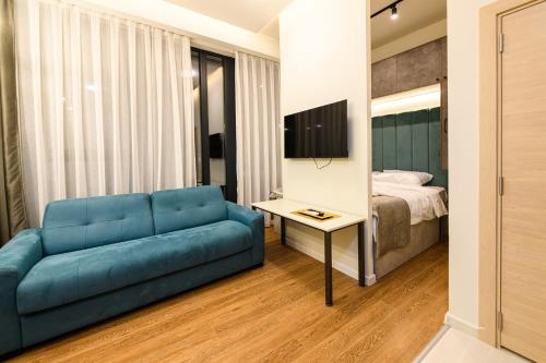 TV a/nebo společenská místnost v ubytování AXIOM Apartments