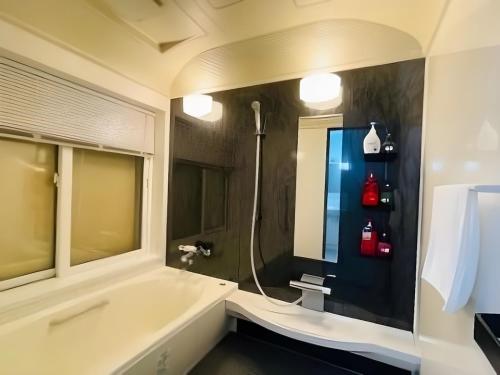 Ένα μπάνιο στο Moonbay Beach Villa