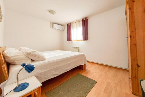Postel nebo postele na pokoji v ubytování Apartment Otava