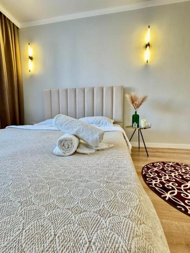 Voodi või voodid majutusasutuse ЖК Найзатас 2 комнатная toas