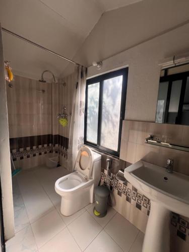 Koupelna v ubytování Avocado Accommodations