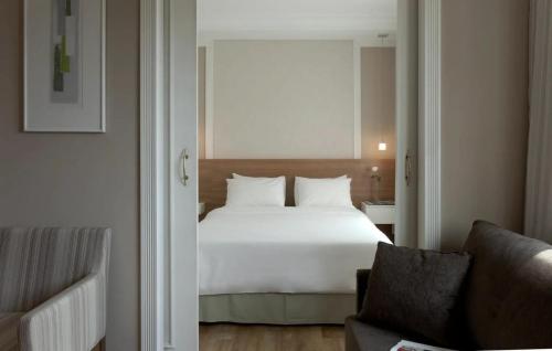 Ένα ή περισσότερα κρεβάτια σε δωμάτιο στο Hotel The Universe 83 Paulista São Paulo