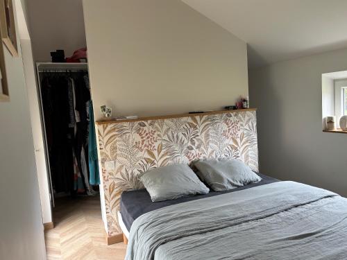 En eller flere senge i et værelse på MAISON CENTRE D'ARNAGE idéal 24h du Mans et Le Mans classic