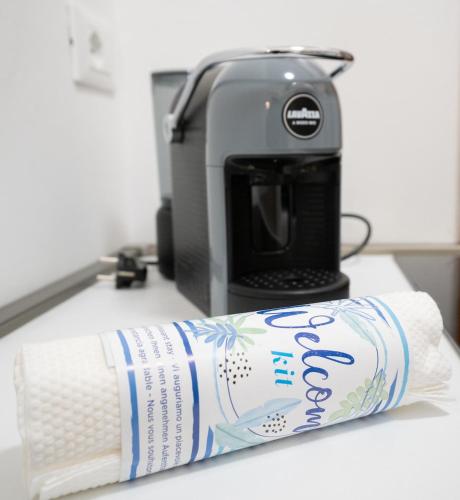a paper towel on a counter next to a toaster at Mar Beauty Apartment in Chioggia