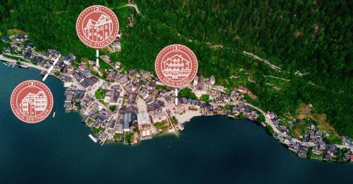 an aerial view of a small island in the water at Heritage Hotel Hallstatt in Hallstatt