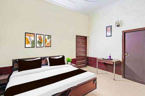 Cama o camas de una habitación en Super Collection O Race Course Dehradun