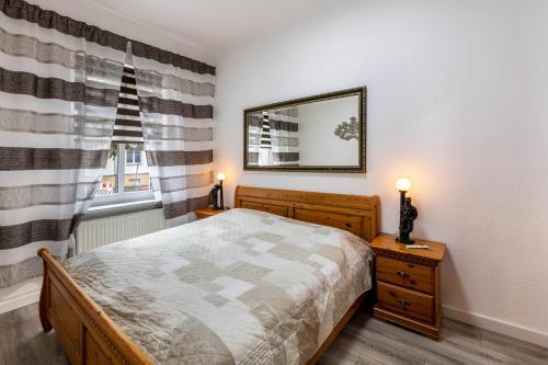 Postel nebo postele na pokoji v ubytování Fewo am Georgengarten - Wohnung 2