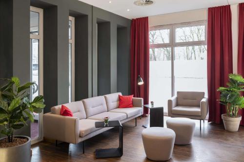 Ruang duduk di NH Collection Hamburg City