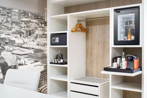 Dapur atau dapur kecil di NH Collection Hamburg City