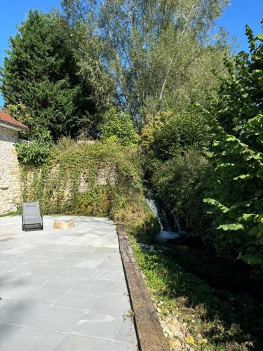 Κήπος έξω από το Gite Le petit Moulin