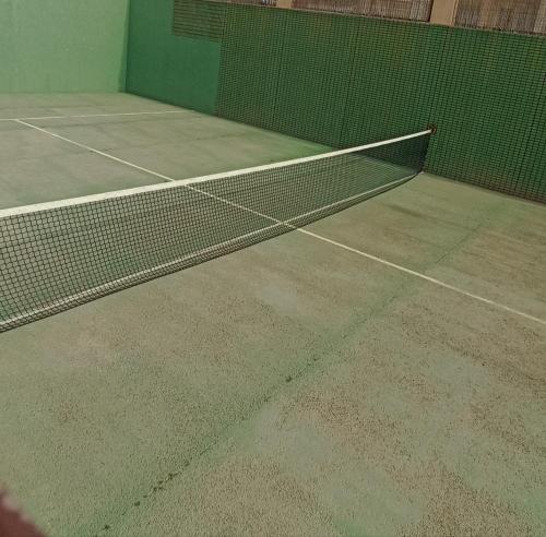 Tenis a/nebo squash v ubytování Apartamento Playa nebo okolí