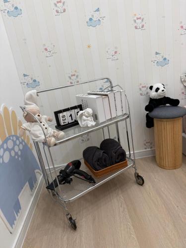 French Style Comfy Homestay Alor Setar 现代极简法式温馨民宿にあるベッド