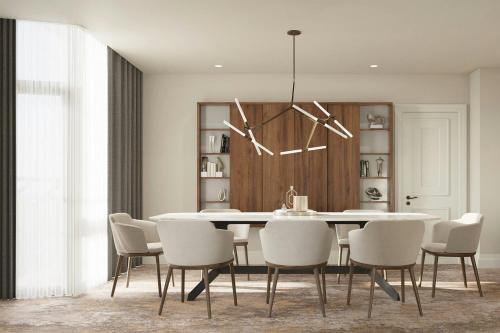 a dining room with a white table and chairs at Lisbon Marriott Hotel in Lisbon