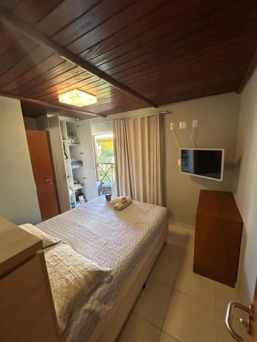 Televisyen dan/atau pusat hiburan di Vilagge PÉ NA AREIA - Itacimirim Bahia