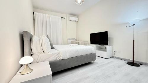 Ένα ή περισσότερα κρεβάτια σε δωμάτιο στο FARSHI home