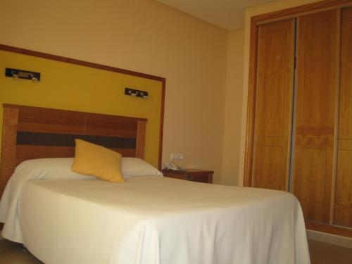 Ένα ή περισσότερα κρεβάτια σε δωμάτιο στο Hotel Sierra Luz