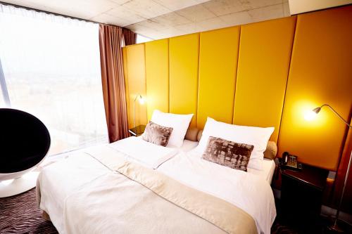 Una cama o camas en una habitación de SONO hotel