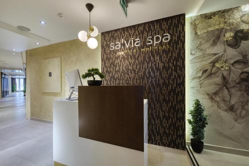 a lobby with a sign that says save saiva spa at Ilirija Resort Hotel Kornati in Biograd na Moru