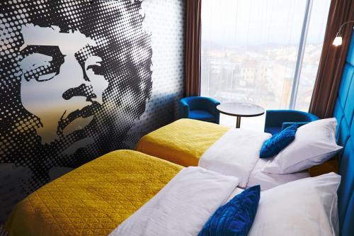 Una cama o camas en una habitación de SONO hotel