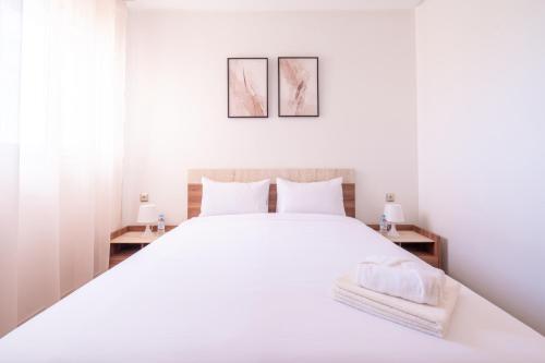 Postel nebo postele na pokoji v ubytování Appartement Premium avec Piscine