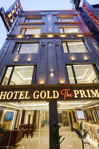 a hotel gold the firm sign in front of a building at Gold The Prime Newly Built 2 Mins From Connaught Place and Railway Station in New Delhi